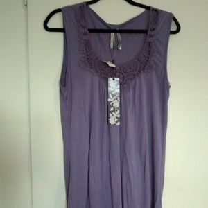 Purple short sleeve top.